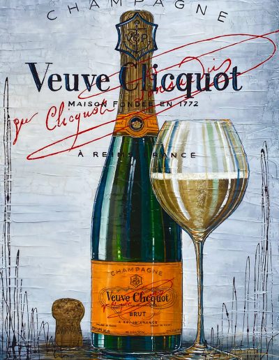 Une bouteille de Veuve Clicquot avec sa coupe à champagne
